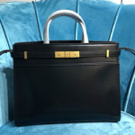 입생로랑 송아지 가죽 핸들 파우더 쇼핑백  568702